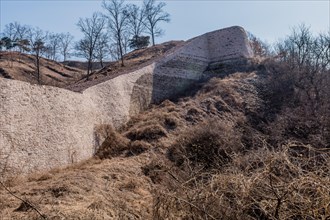 Section of mountain fortress wall located on sunny winter day in Boeun, South Korea, Asia