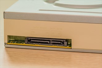 Close-up of a beige computer expansion slot on a motherboard, in South Korea