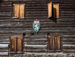 Coat of arms of Styria, facade of a wooden hut, Jassing, Styria, Austria, Europe