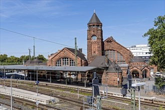 Historic Wilhelmine railway station, old and new parts, clock tower with station building and
