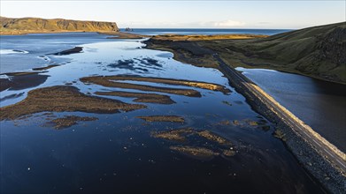 Dyrholaos lagoon in the evening light, drone shot, Sudurland, Iceland, Europe