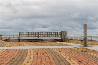 Empty viewing platform facing the sea with a wide-open space under a cloudy sky, in Ulsan, South