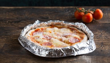 Food, frozen pizza, still in foil, raw, AI generated, AI generated
