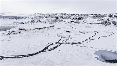 Overgrown river landscape, onset of winter, Fjallabak Nature Reserve, drone shot, Sudurland,