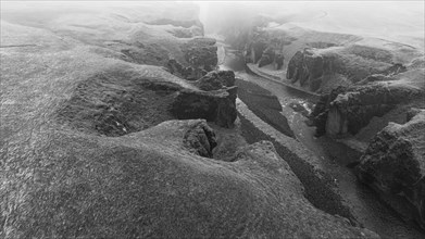 Fjadrarglijufur Canyon in the fog, Justin Bieber Canyon, drone image, black and white image,