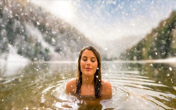 A young pretty woman bathes in an ice-cold lake in snowfall, AI generated, AI generated