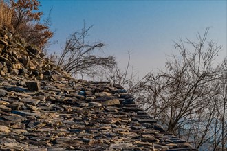 Top of section of mountain fortress wall made of flat stones located in Boeun, South Korea, Asia