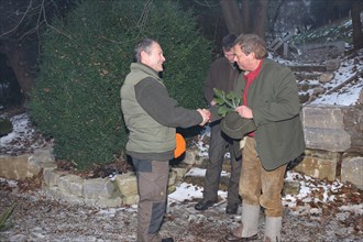 Wild boar (Sus scrofa) end of the hunt, huntsman presents a marksman with the so-called