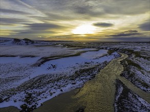Overgrown river landscape, onset of winter, sunset, Fjallabak Nature Reserve, drone shot,