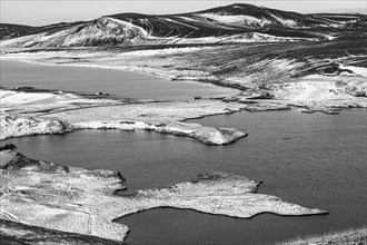 Crater lakes in volcanic landscape, onset of winter, black and white image, Fjallabak Nature