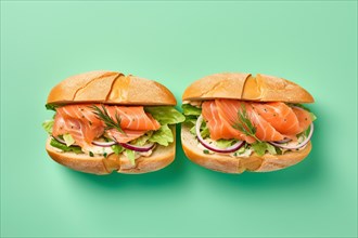 Sandwiches with salmon and onions on green studio background. KI generiert, generiert, AI generated