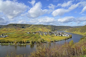 View of the wine village Ellenz-Poltersdorf, district Ellenz with autumnal vineyards, blue cloudy