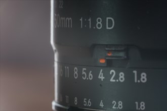 Close up detailed shot of a prime lens 50mm f1.8g in soft natural light