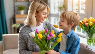A mother and her son smile at each other while the boy gives her yellow and purple tulips, AI