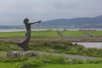 A shot of Niall Bruton's outstanding statue, Waiting on the Shore, depicting a woman with arms
