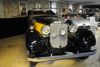Deutsches Automuseum Langenburg, Yellow-black Mercedes-Benz Cabriolet on display in a classic car