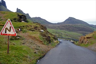 Narrow road leads through a barren mountain landscape, Quiraing, Isle of Skye, Hebrides, Scotland,
