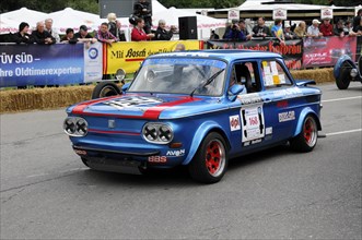 NSU TT, model year 1968, A blue rally car with the number 168 in front of spectators at a historic