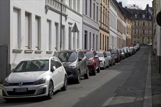 Lined up parked cars in a residential street, Vohwinkel, Wuppertal, Bergisches Land, North