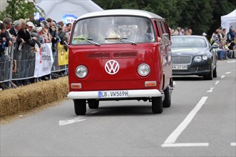 Front view of a red VW bus on a street at an event, SOLITUDE REVIVAL 2011, Stuttgart,