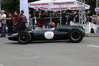 Vintage racing car at the starting line, ready to race, with the driver in focus, SOLITUDE REVIVAL