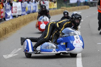 Rider and passenger in a bend during a motorbike race with sidecar, SOLITUDE REVIVAL 2011,