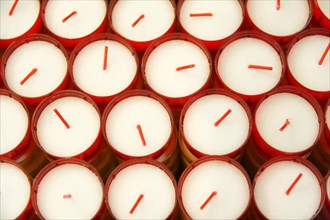 Church of Notre-Dame de la Garde, Marseille, Several white candles in red containers form an