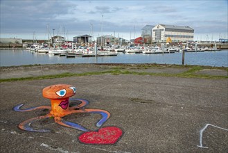 Painted bollards, octopus, boats, buildings, marina, Dunkirk, France, Europe