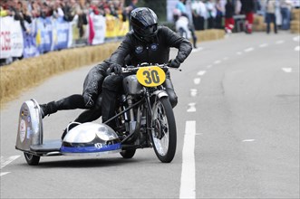 A racer on a classic motorbike takes part in a race, SOLITUDE REVIVAL 2011, Stuttgart,