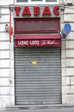 Marseille, Closed tobacco shop with red awning and golden letters, Marseille, Departement