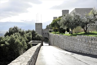 Path to the Gothic castle Castillo de Santa Catalina, Jaen, Jaen province, stone fortress with