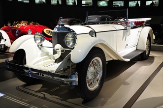 Highly polished white classic car in a motor show, Mercedes-Benz Museum, Stuttgart,