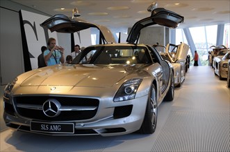 Museum, Mercedes-Benz Museum, Stuttgart, Silver Mercedes-Benz SLS AMG with open gullwing doors in a