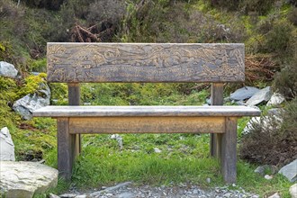 Bench with engraved picture, Snowdonia National Park near Pont Pen-y-benglog, Bethesda, Bangor,