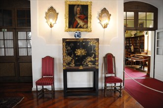 Langenburg Castle, An elegant room with historical furniture, paintings and visible furnishings,