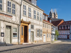 Street with half-timbered houses and cobblestones at the Jewish museum in the historic old town, in