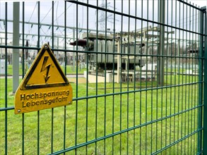 Warning sign Warning high voltage Danger to life on fence of substation Transformer station Part of