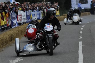 Motorbike with sidecar in action on a race track with spectators, SOLITUDE REVIVAL 2011, Stuttgart,