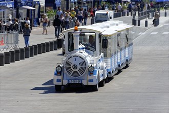 Marseille, Blue and white tourist train travelling on a promenade, Marseille, Departement