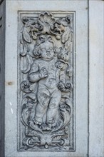 Relief of a child, architectural details at the Residenzschloss in the Inner Old Town of Dresden,