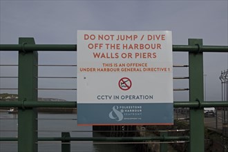 Do not jump off the bridge sign, Folkestone harbour, Kent, Great Britain