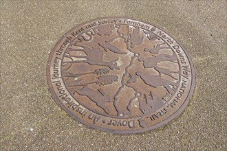 Plaque in the pavement showing the North Downs Way National Trail, Dover, Kent, Great Britain