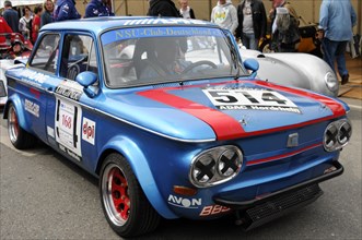 NSU TT, built in 1968, A blue NSU racing classic car with the number 168 is surrounded by