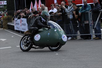 Sidecar race with a motorbike rider, surrounded by spectators at the race track, SOLITUDE REVIVAL