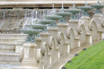 Palais Longchamp, Marseille, details of a historic cascading fountain with green patina and flowing