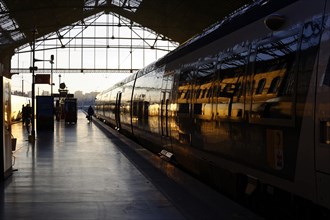 Marseille-Saint-Charles railway station, Marseille, Reflection of the evening sun on a train in a