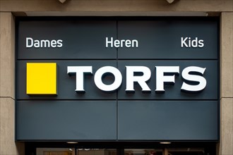 Shoe shop sign with logo of the Flemish chain store Schoenen Torfs in Flanders, Belgium, Europe