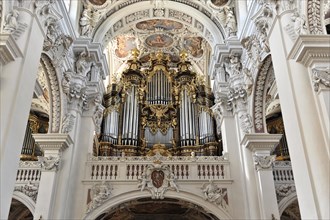 St Stephan's Cathedral, Passau, majestic baroque church organ with gilded ornaments and figures,