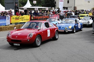 Red and blue classic sports cars on the racetrack, surrounded by spectators, SOLITUDE REVIVAL 2011,