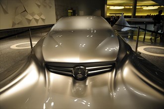 Futuristic concept car from Mercedes-Benz with glossy surface and strong lighting, Mercedes-Benz